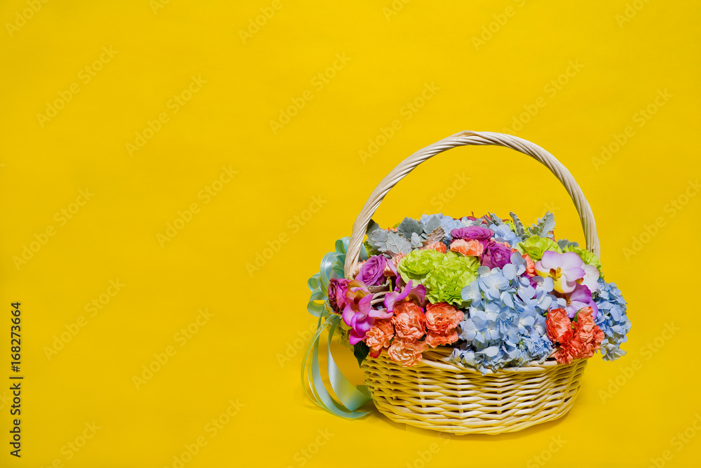 flower basket on yellow background