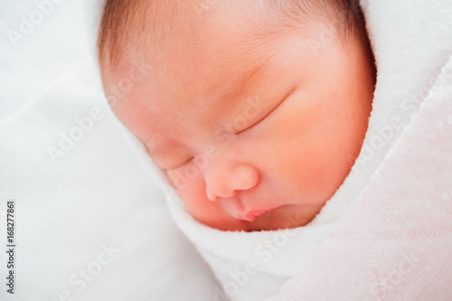 Newborn baby girl sleeping