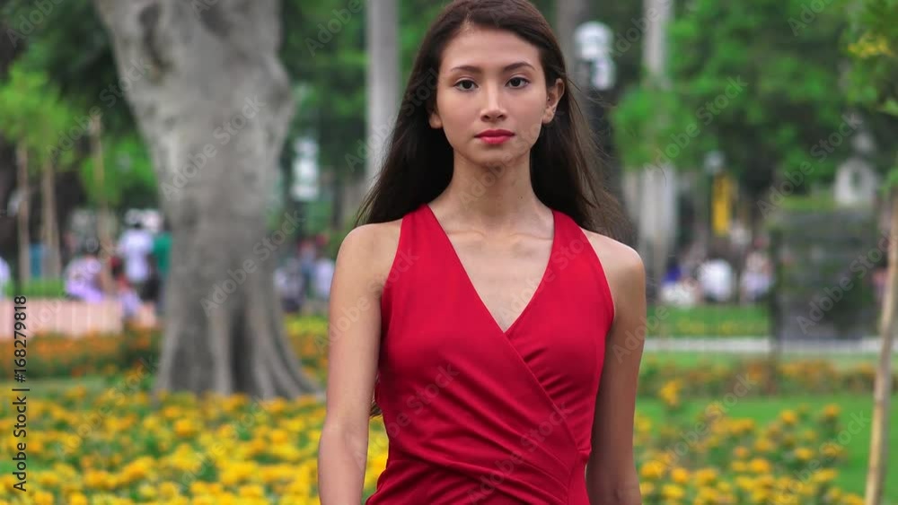 Young Female Walking In Park Young Female Walking In Park