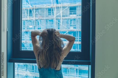 Woman annoyed by building works