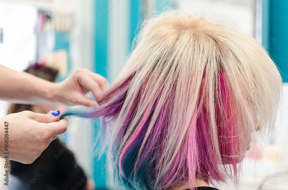 Naklejka premium Side view of rainbow or unicorn hair