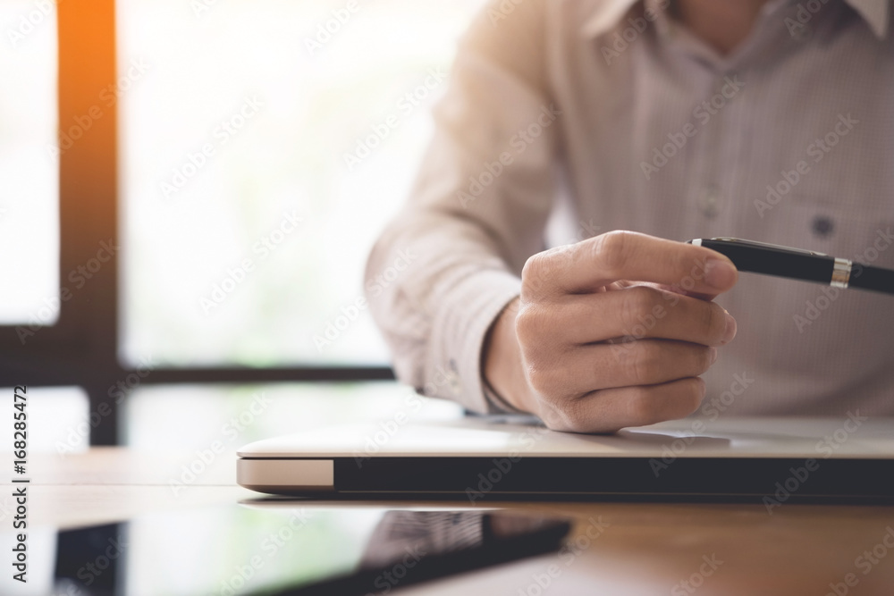 Fototapeta premium closeup view of young businessman in working at office