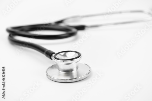 Close up view of black stethoscope on white isolate background