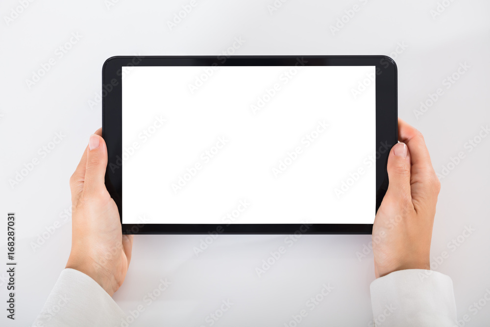 Businessperson Using Digital Tablet With Blank White Screen Businessperson Using Digital Tablet With Blank White Screen