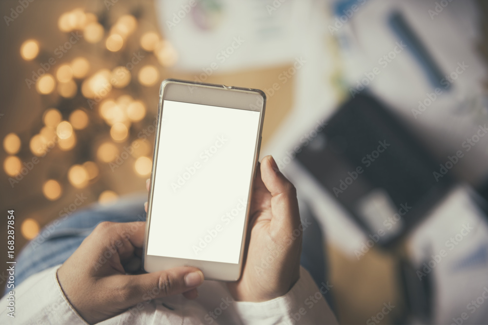 Girl with a smart phone with blank display Girl with a smart phone with blank display