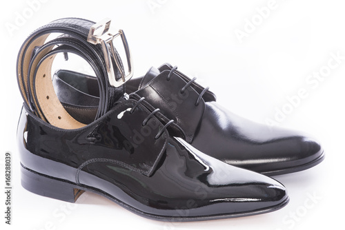 Men shoes collection - shoes and belt on a white background