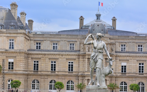 The senate and the statue in the garden of Luxembourg, Paris, France,