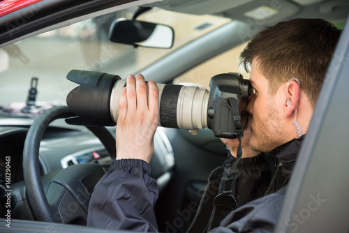 Man Photographing With Slr Camera