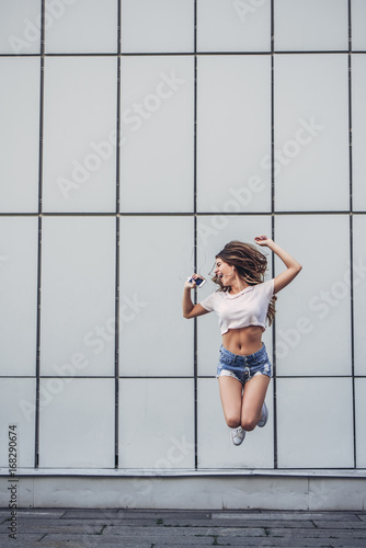 Fototapeta Naklejka Na Ścianę i Meble -  Beautiful teenager having fun