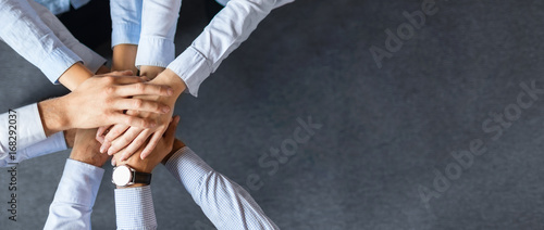 Stack of hands. Unity and teamwork concept.