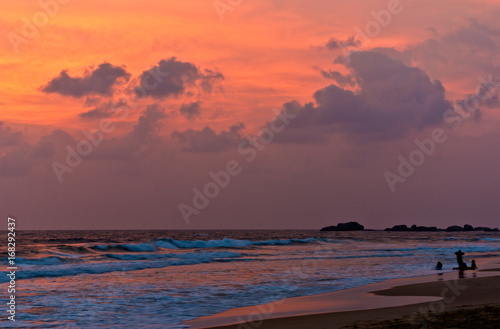 Fototapeta Naklejka Na Ścianę i Meble -  Beautiful sunsets in Sri Lanka. The views of the Indian ocean. The most beautiful beaches in the world.