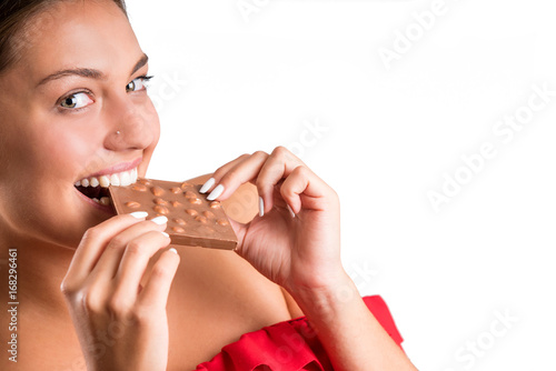 Beautiful woman holding chocolate bar