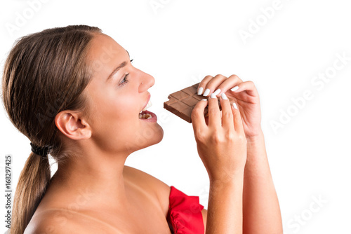 Beautiful woman holding chocolate bar