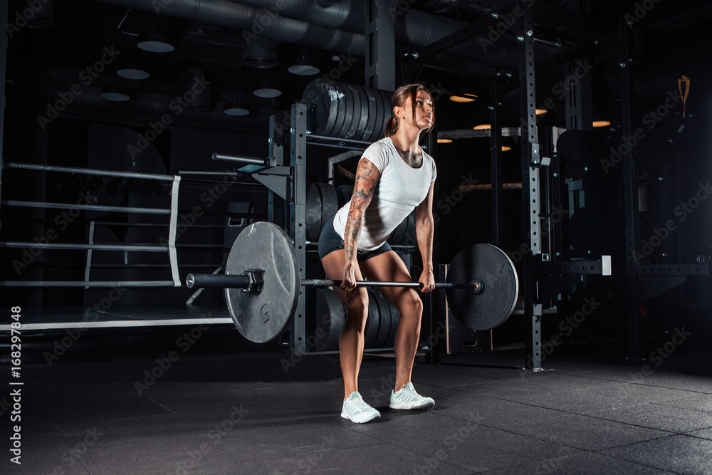 Woman in sportswear doing crossfit workout Woman in sportswear doing crossfit workout