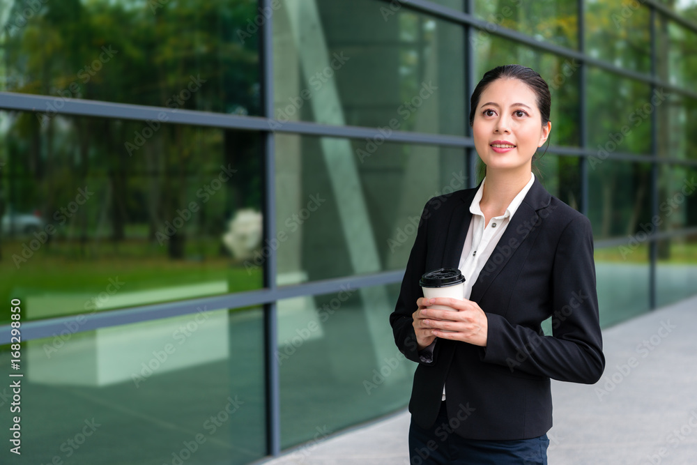 pretty manager girl smiling holding hot espresso pretty manager girl smiling holding hot espresso