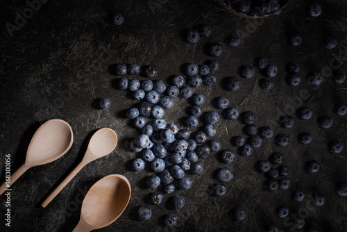 blueberries and wooden spoons