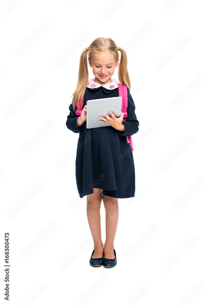 schoolgirl using digital tablet