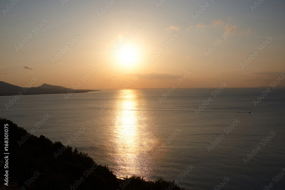 Sunset over the greek sea.