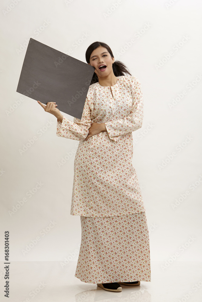 woman holding black cardboard