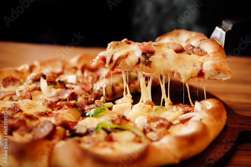 Fotografiet Hot pizza cheese crust seafood topping sauce vegetables delicious fast food
