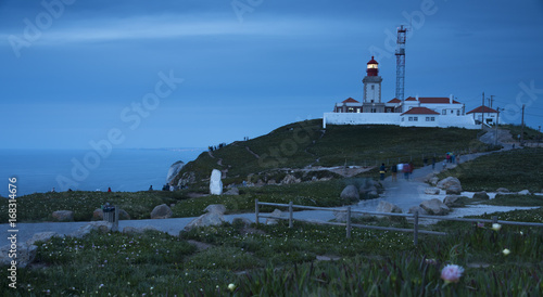 Lighthouse on the Cape Roca end of the world in dusk time
