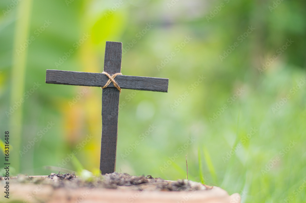 Wood cross or religion symbol shape over wood  background for God, Christ, Christianity, religious, faith, holy, spiritual, Jesus, belief or resurrection, dust as christian religion, 