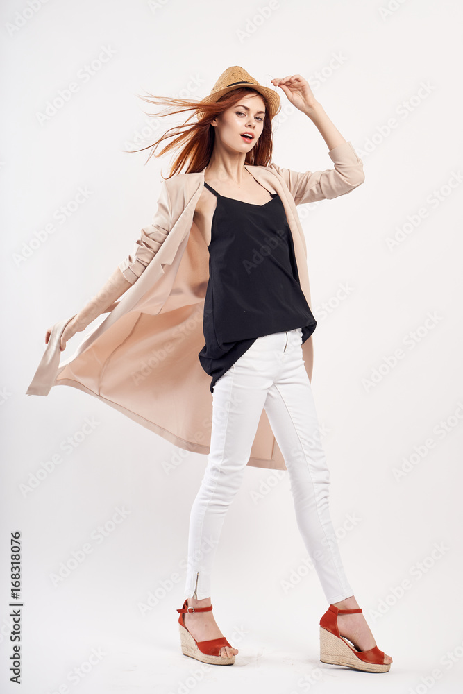 Young beautiful woman in a hat on white isolated background, fashion, style, beauty Young beautiful woman in a hat on white isolated background, fashion, style, beauty