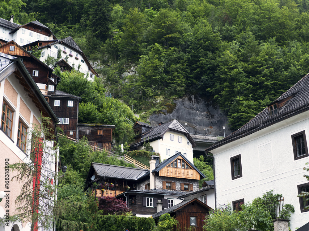 Town Hallstatt with mountain lake and salt mines. Alpine massif, beautiful canyon in Austria. Salzburg Alpine valley in summer, clear water. Destination for vacation, hiking and relaxation.