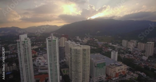 Modern Apartment Buildings on Gurney Drive at Sunset, Penang, Malaysia, Aerial Approach Shot
 photo