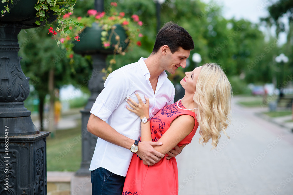 Guy and girl are hugging in the Park. Guy and girl are hugging in the Park.