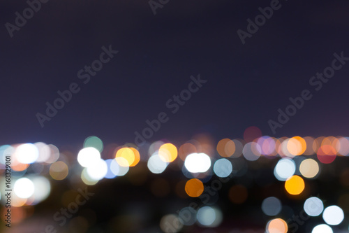 city night with dark sky, abstract blur bokeh light background © sutichak