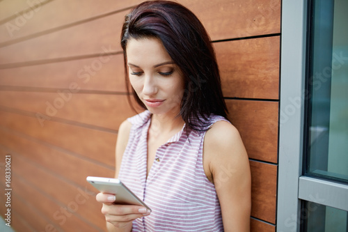 Girl with a smartphone photo