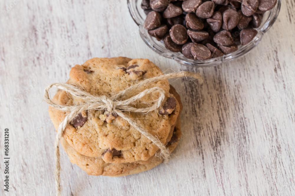chocolate Chip Cookies Tied With Twine And Chips In Bowl chocolate Chip Cookies Tied With Twine And Chips In Bowl