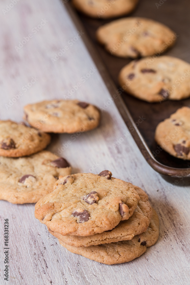 Chocolate Chip Cookies In A Row and On Cookie Sheet Chocolate Chip Cookies In A Row and On Cookie Sheet