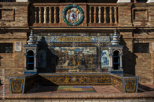 Spagna: ornamenti in ceramica dedicati alle 48 province spagnole con mappe, mosaici raffiguranti eventi storici e stemmi in Plaza de Espana, la piazza più famosa di Siviglia photo