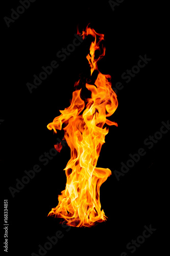 Fire flame isolated on black isolated background - Beautiful yellow, orange and red and red blaze fire flame texture style. © lukyeee_nuttawut