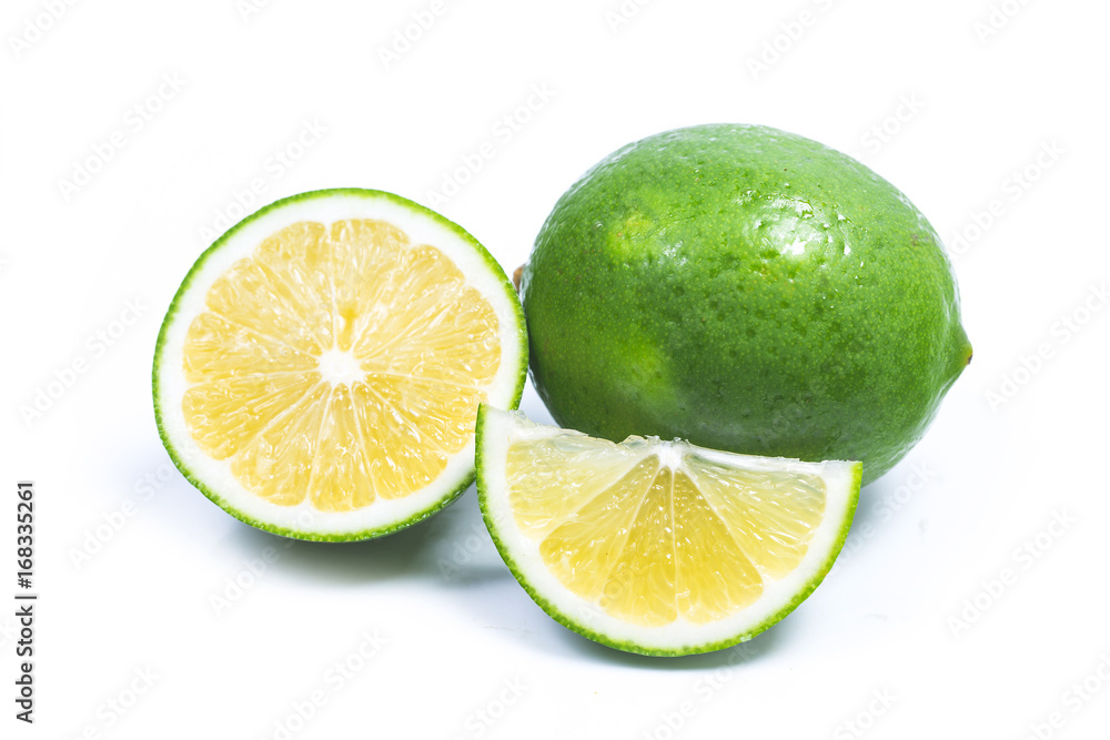 lime with slices and leaf isolated on white background lime with slices and leaf isolated on white background