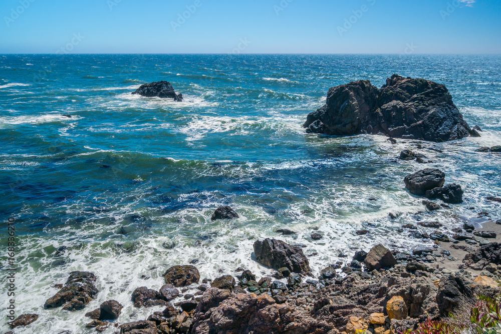 Incredible landscape of the coast. Beautiful blue sea. The waves rolled ashore and breaking on the rocks. Sonoma Coast State Park, California, USA Incredible landscape of the coast. Beautiful blue sea. The waves rolled ashore and breaking on the rocks. Sonoma Coast State Park, California, USA