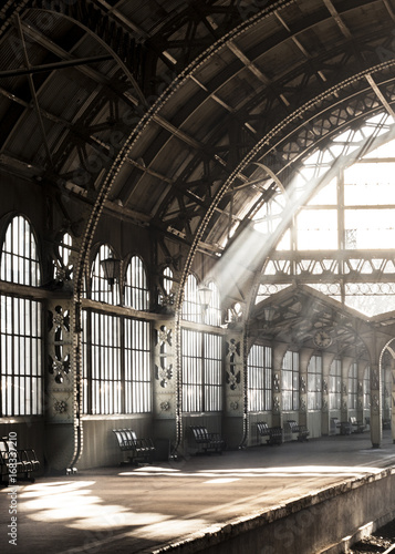 Vntage old-style architectural romantic train station. Light ray inside railway station. 