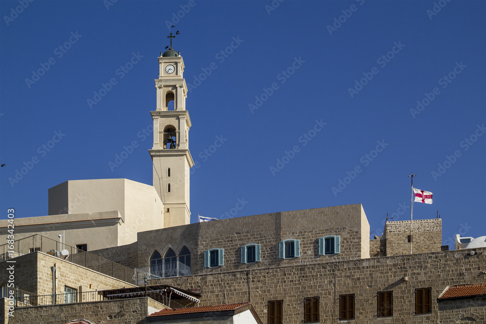 Old Jaffa - Bell tower of St. Peter catholic church and abbey in Old Jaffa as seen from the Sea.Israel