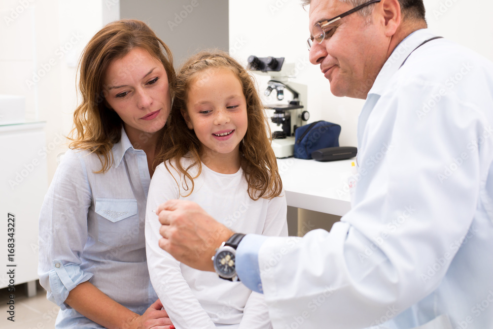Fototapeta premium Doctor and young patient in office