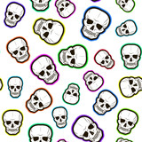 seamless pattern of colored skulls. vector illustration