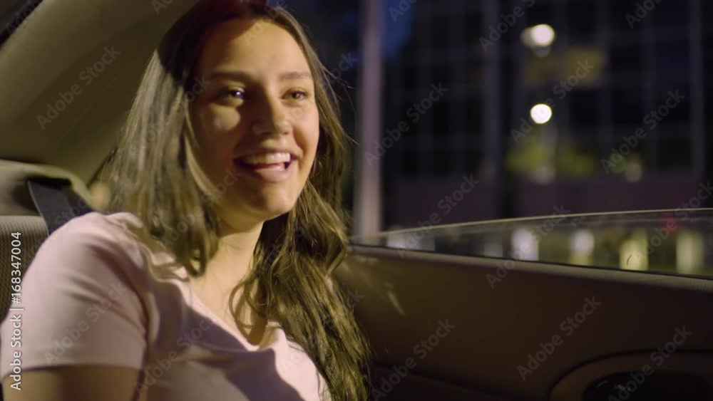 Teen Girl Practices Dance Moves In Back Seat, Her Friend Teaches Her From The Passenger Seat In Front 