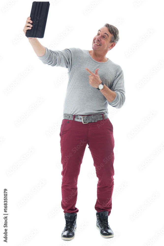 Person does pose during a video conference. Gray-haired man wears red pants and walks gray.. Person does pose during a video conference. Gray-haired man wears red pants and walks gray..