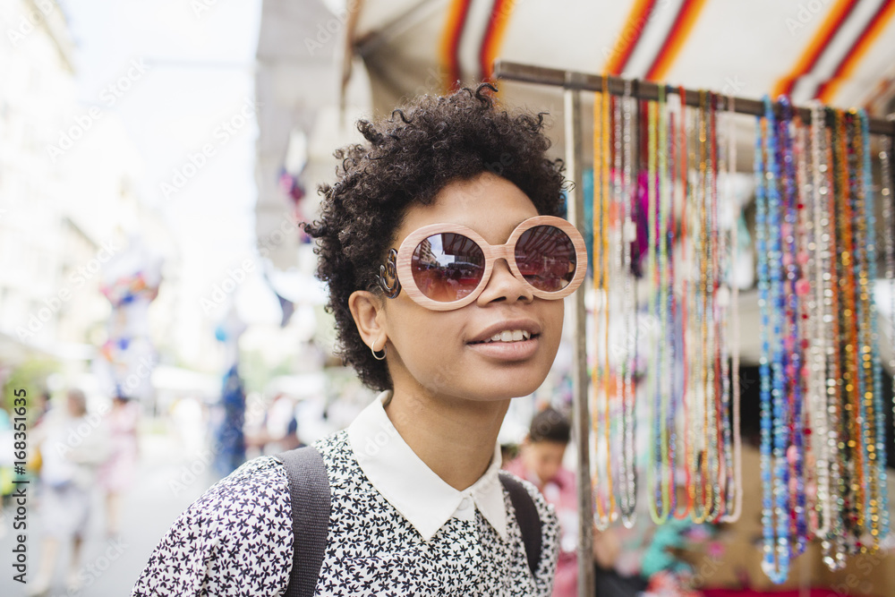 Beautiful afro woman wearing a pair of sunglasses Beautiful afro woman wearing a pair of sunglasses