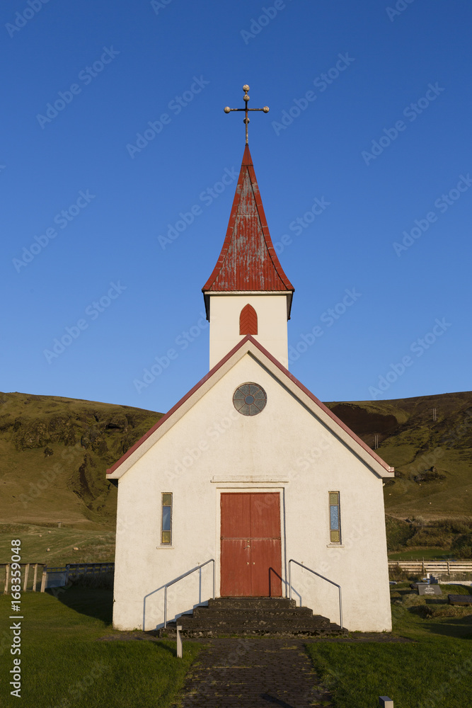 Picturesque church with a red roof in island
