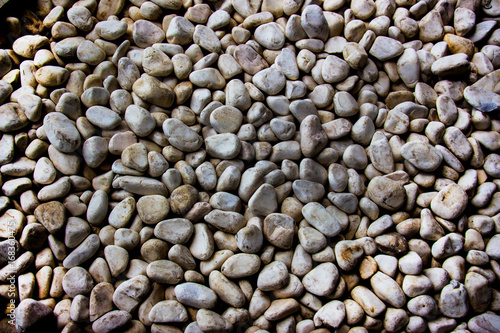 Wall of smooth stones