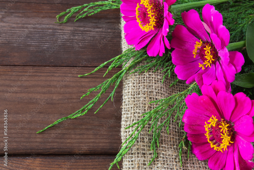 Flowers of a cinnamon in a bouquet on the background of a wooden old table in a rustic vintage style with copy space and space for text Flowers of a cinnamon in a bouquet on the background of a wooden old table in a rustic vintage style with copy space and space for text