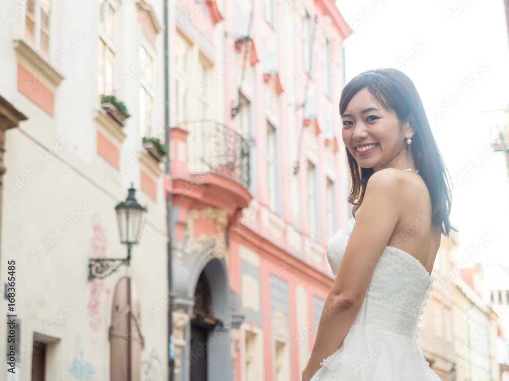 Fototapeta premium attractive asian woman wedding image in europe