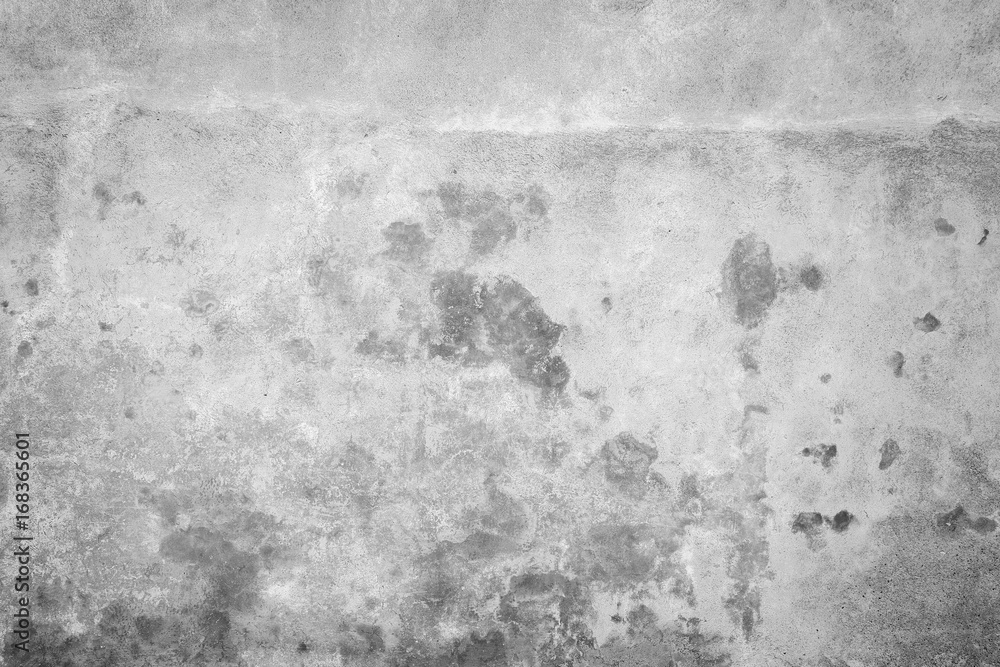 Obraz premium Weathered and aged concrete wall, paint peeled off. Texture background with vignetting in black and white.